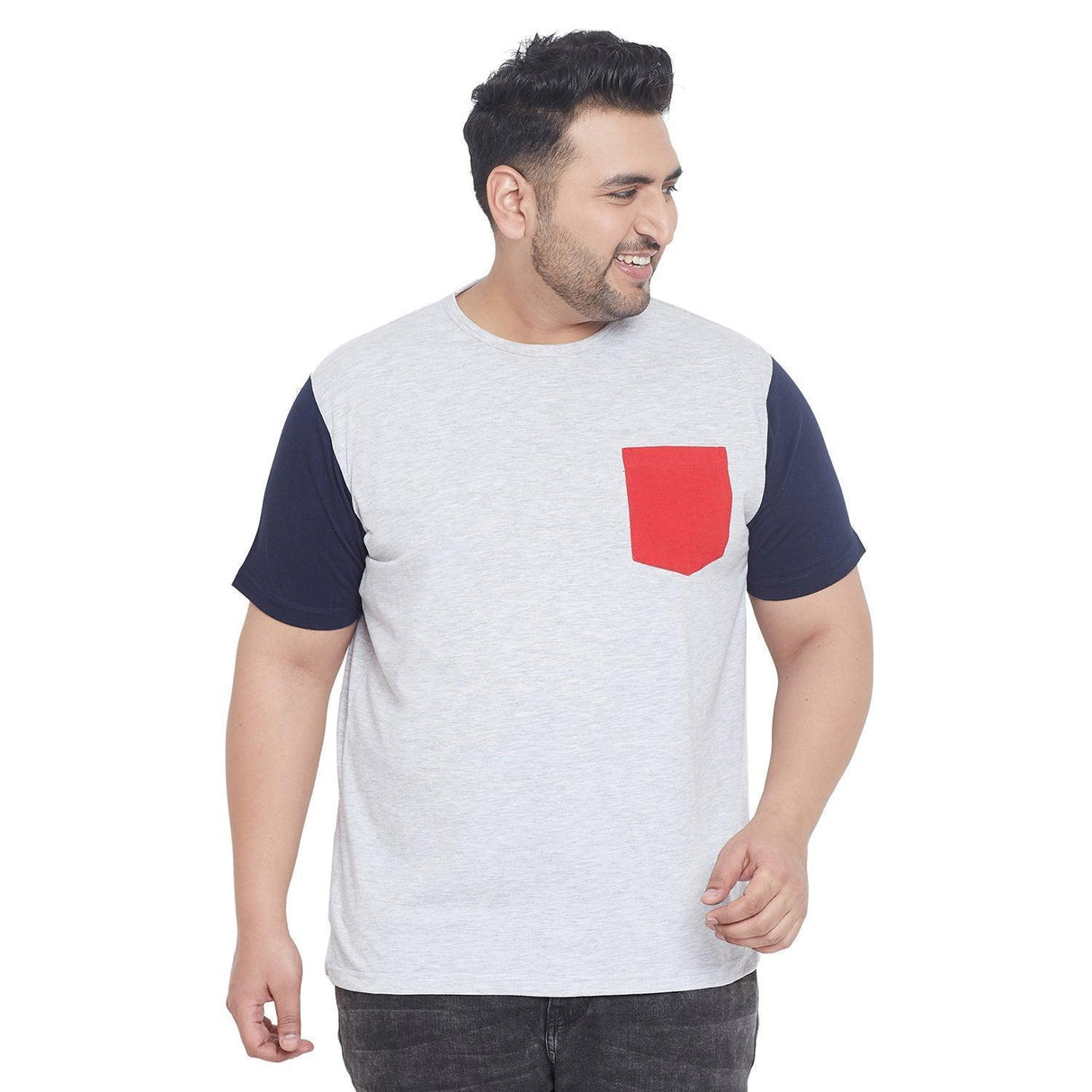 Plus size man wearing light grey t-shirt with red pocket and navy sleeves, casual fashion