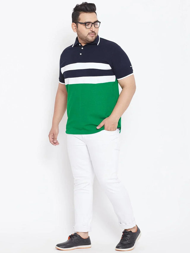 Plus size man wearing a colorblock polo t-shirt and white jeans, casual outfit style