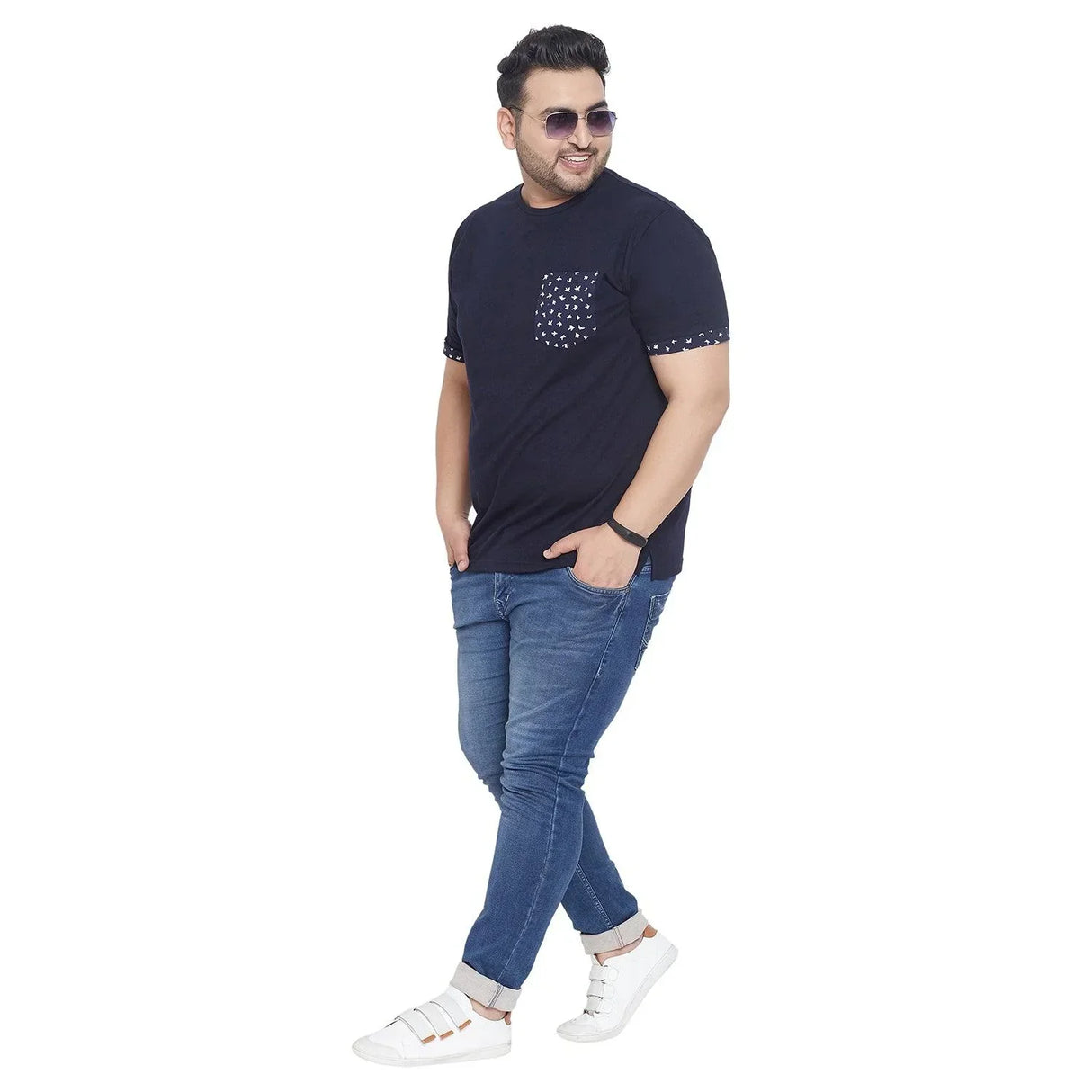 Plus size man in navy printed pocket t-shirt and blue jeans, casual men's fashion India