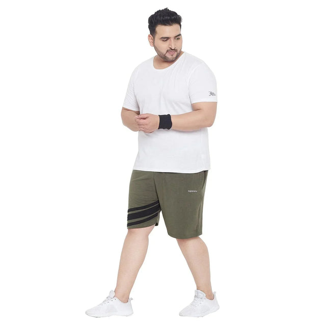 Plus size man wearing white t-shirt and olive green shorts with black stripes, sporty look