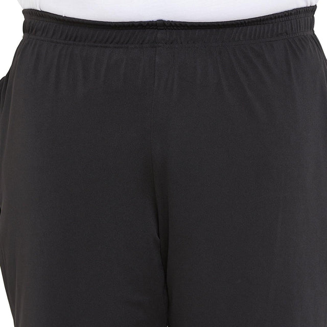 Close-up of men's plus size black elastic waist joggers