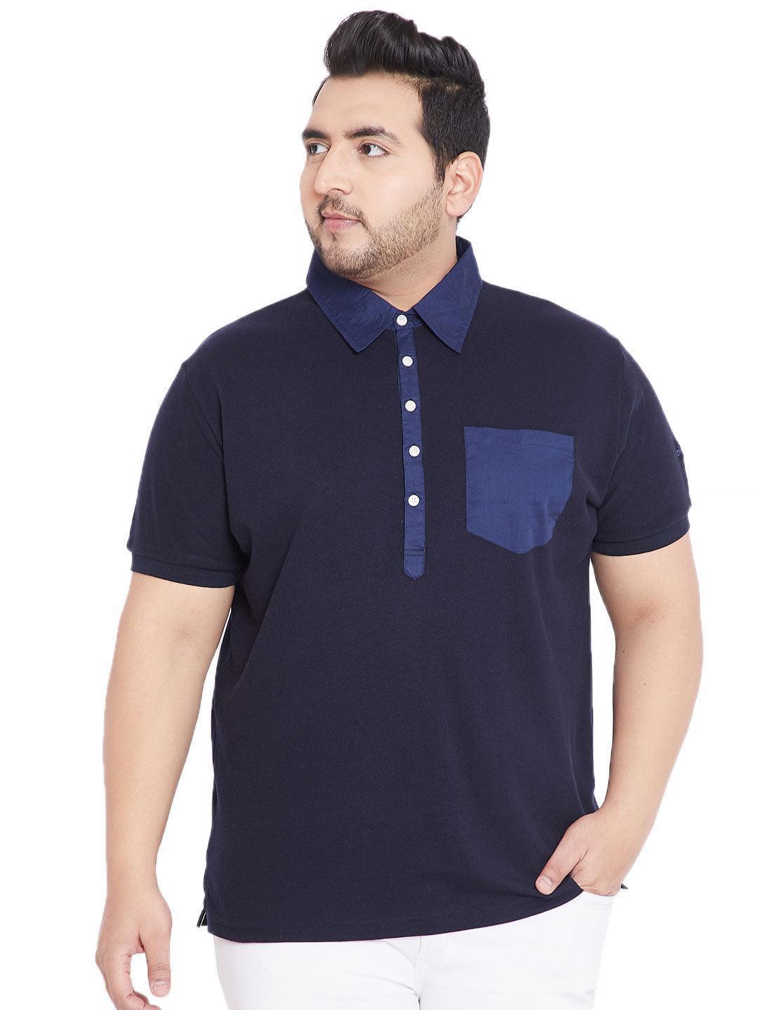Plus size man in navy blue short sleeve polo shirt with blue collar and chest pocket