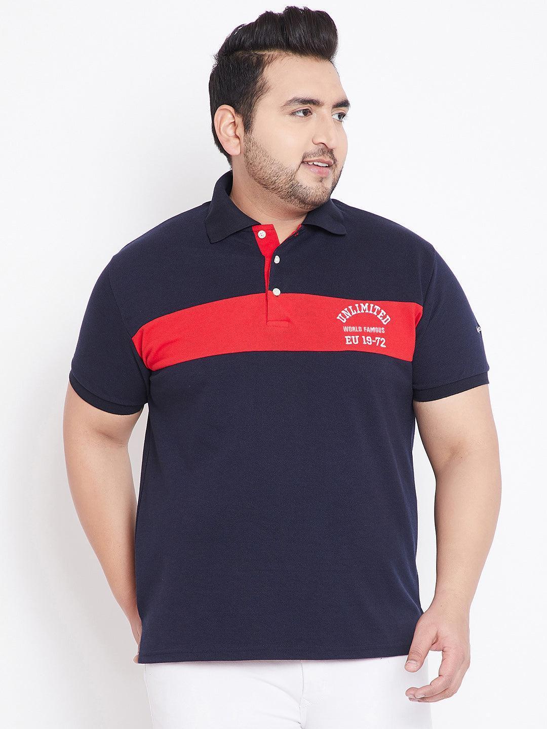 Plus size man wearing navy blue and red polo shirt with printed chest text, white background