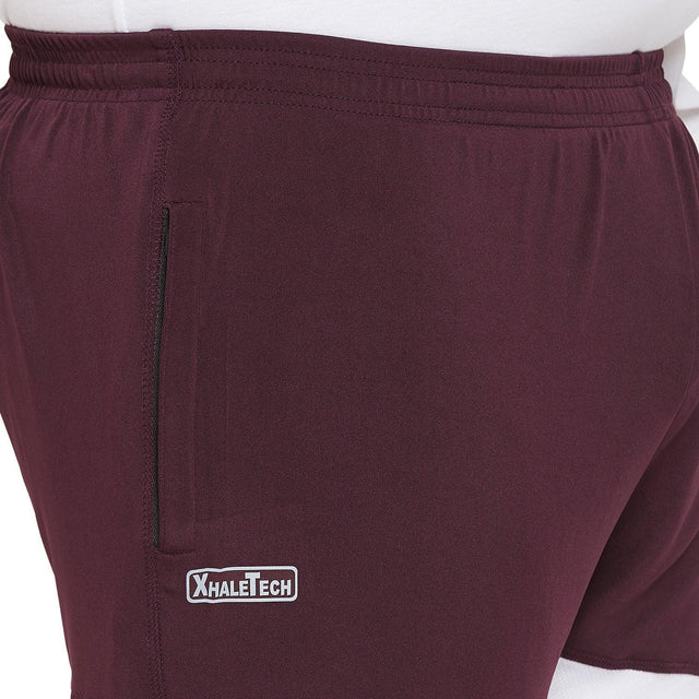 Close-up of maroon plus size men's joggers with elastic waist and XhaleTech logo