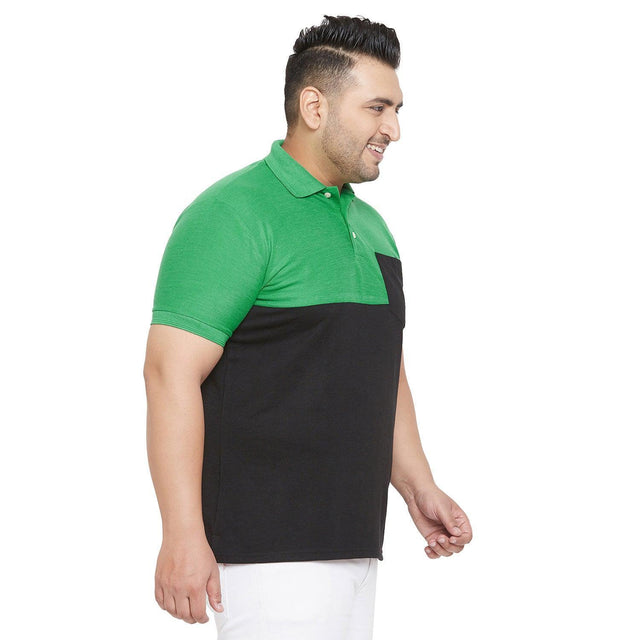 Plus size man wearing green and black colorblock polo t-shirt with pocket, side view
