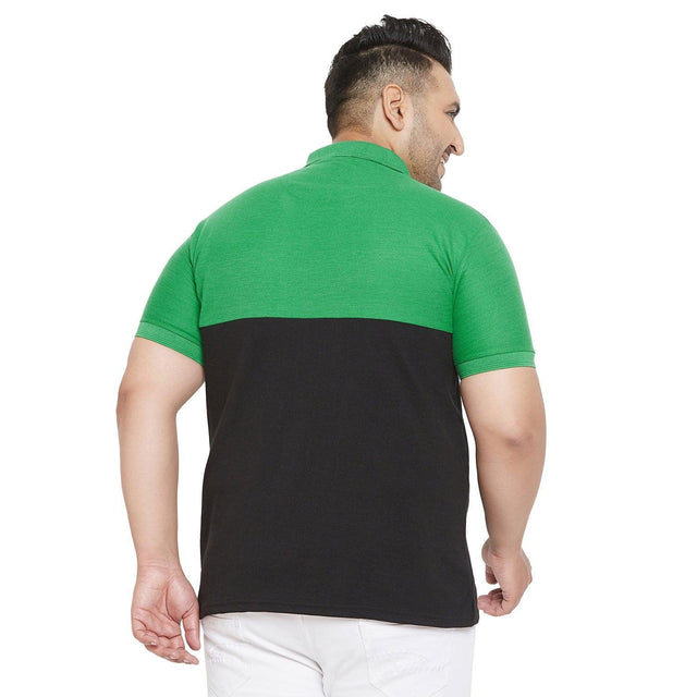Back view of a man wearing a green and black colorblock polo t-shirt, plus size fashion