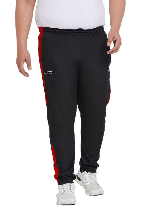 Men's plus size black joggers with red side stripes and white sneakers