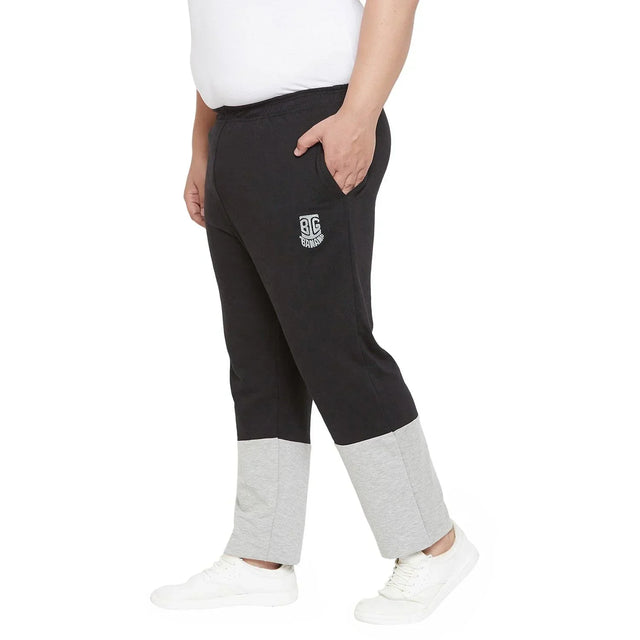 Plus size men's black and grey colorblock joggers with elastic waist and patch logo