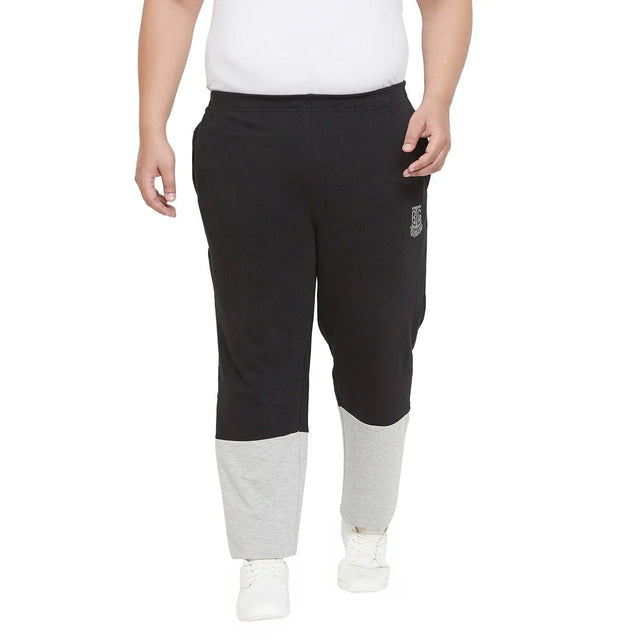 Men's plus size black joggers with grey color block legs, elastic waist, casual fit
