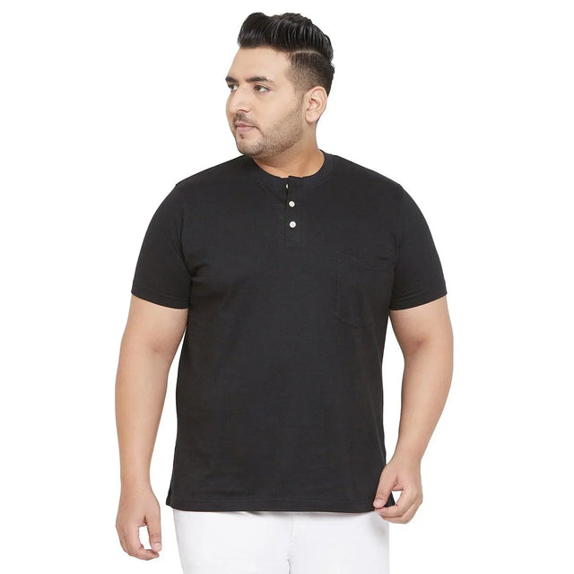 Plus size man in black short sleeve henley t-shirt with front pocket, white background