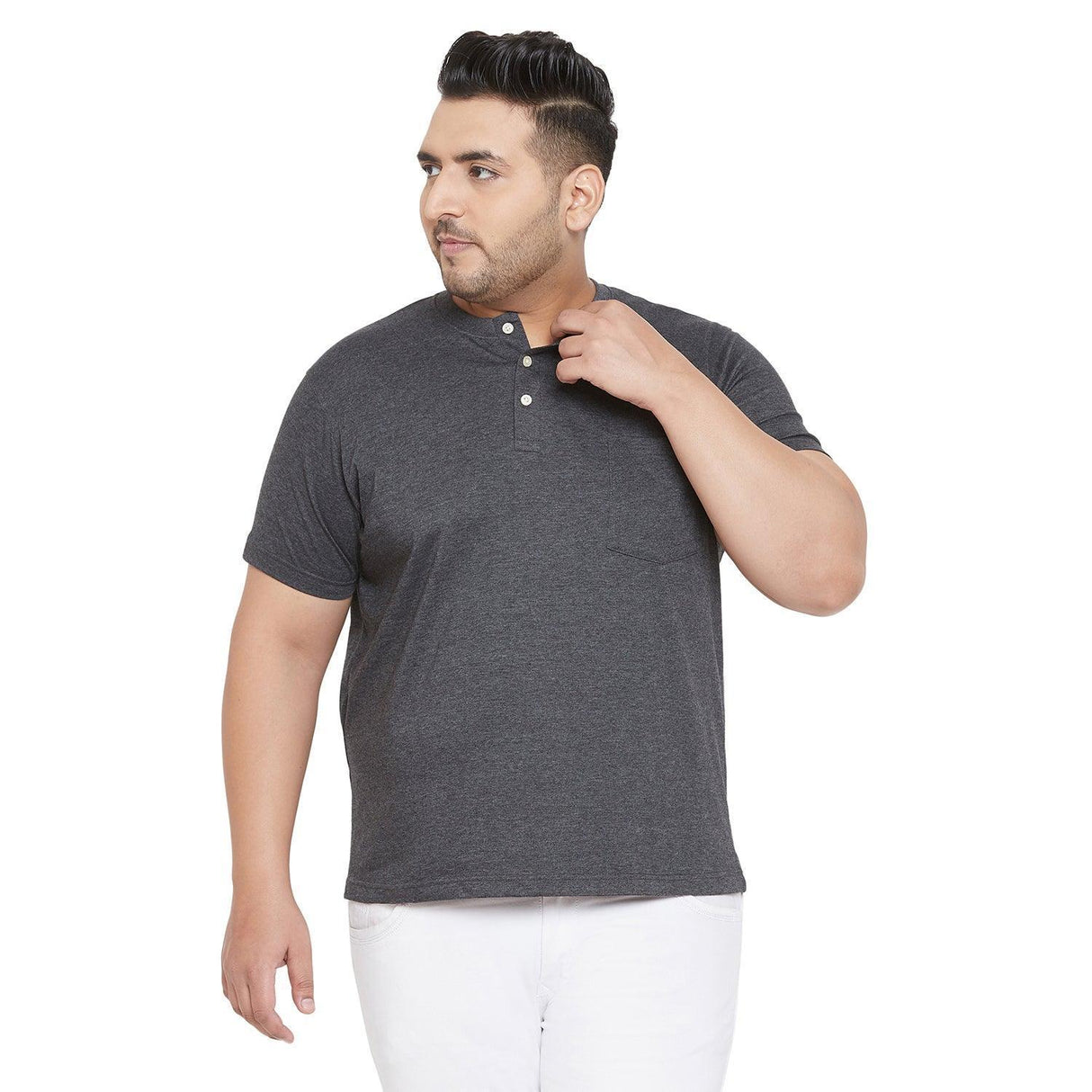 Plus size man wearing grey short sleeve henley t-shirt and white pants