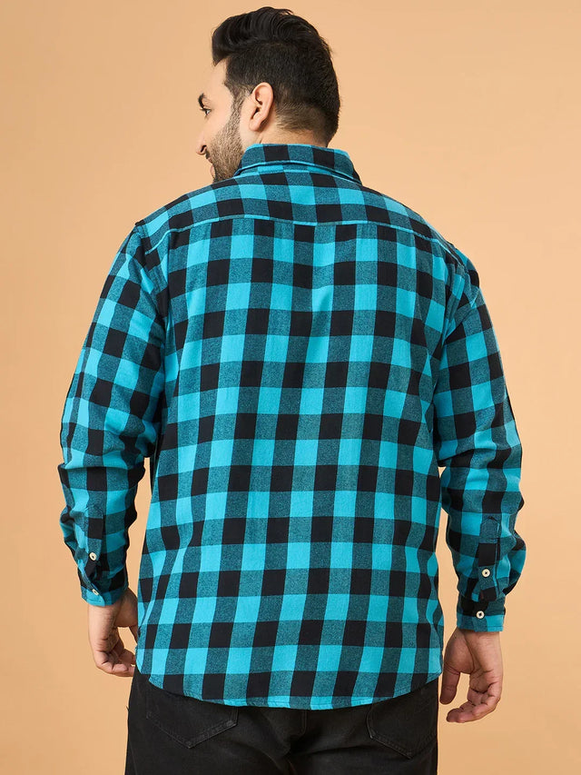 Plus size man wearing blue and black checkered shirt, back view, casual fashion