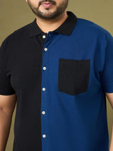 Men’s plus size colorblock polo shirt with buttons and chest pocket, half black and blue.