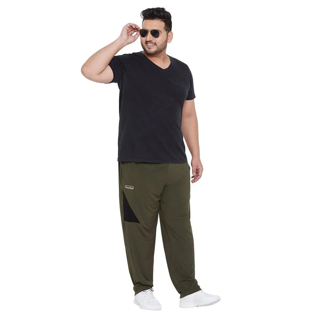 Plus size man in black V-neck t-shirt and olive green joggers, casual fashion, white background