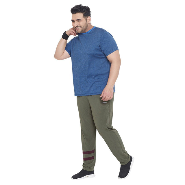 Plus size man in blue t-shirt and olive joggers with maroon stripes, casual wear