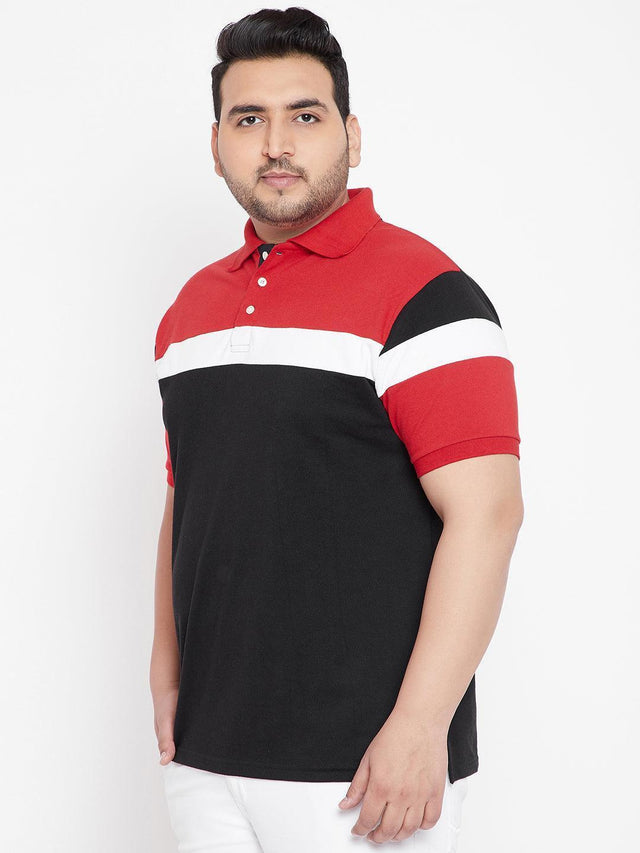 Plus size man wearing red, white, and black colorblock polo t-shirt against white background