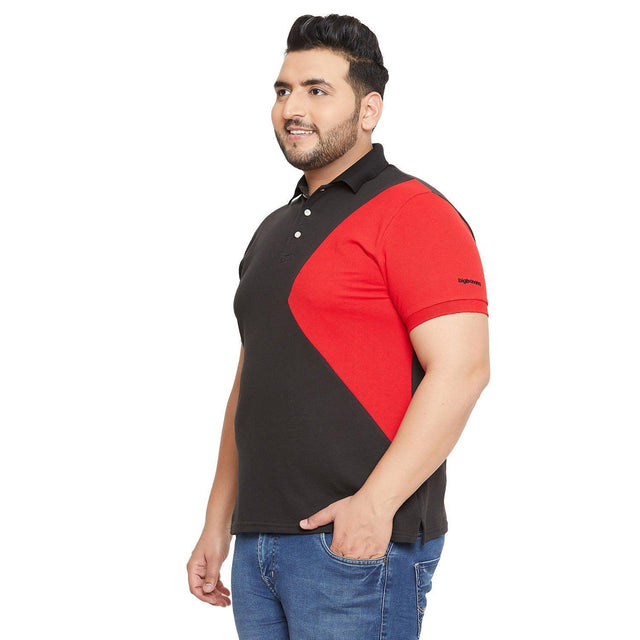 Plus size man wearing black and red polo t-shirt with blue jeans on white background
