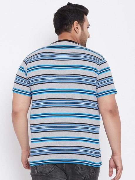 Back view of a man wearing a grey and blue striped plus size t-shirt with short sleeves