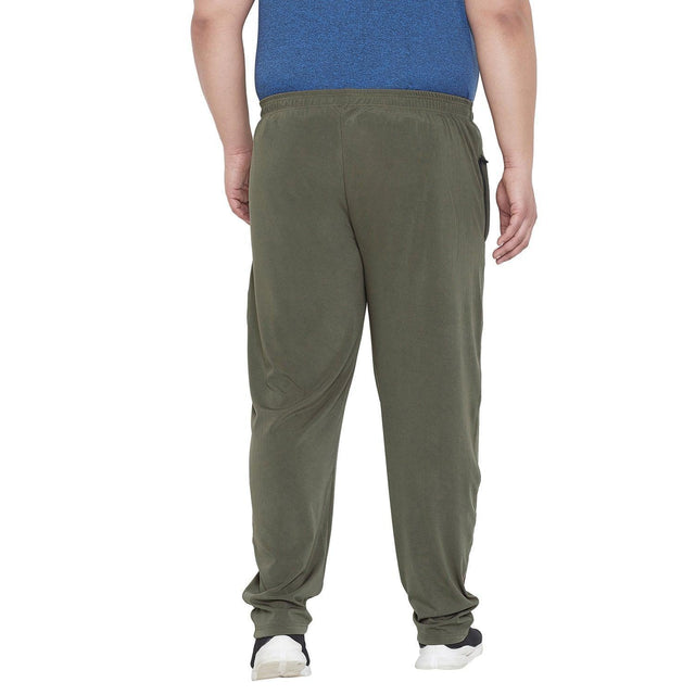Back view of man wearing olive green plus size joggers and a blue t-shirt