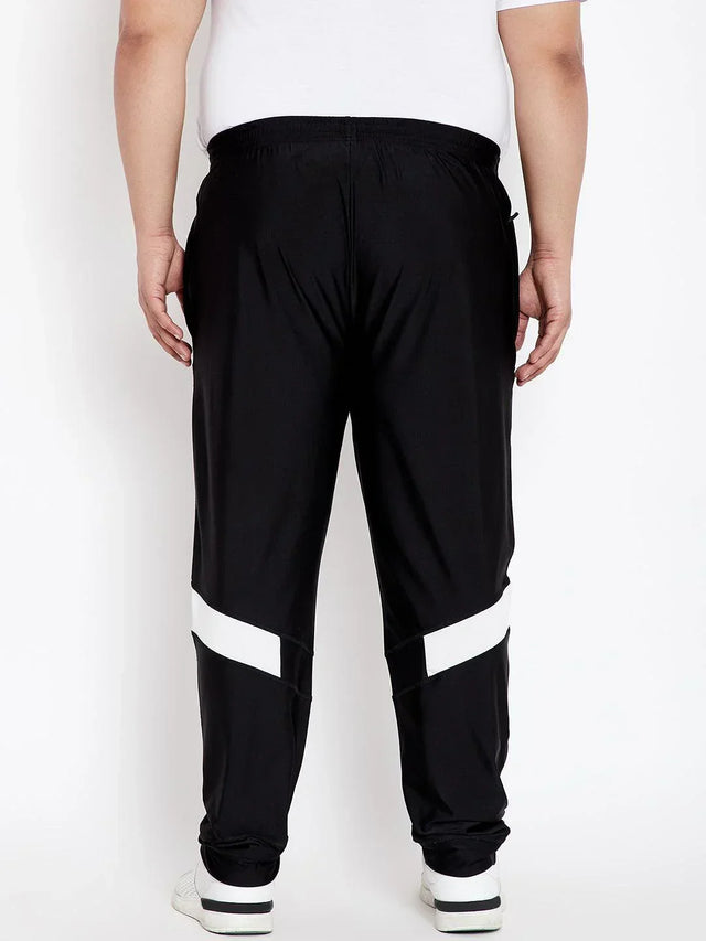 Back view of plus size men's black joggers with white stripes, elastic waistband