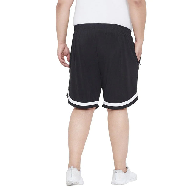 Men's plus size black shorts with white trim, elastic waist, back view