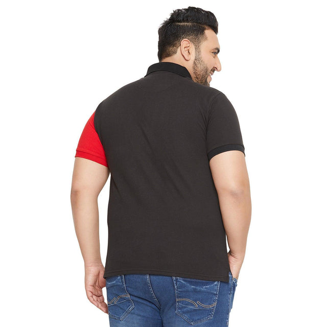 Plus size man wearing black polo shirt with red sleeve and blue jeans, back view