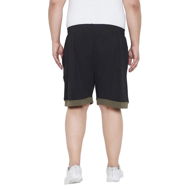 Back view of plus size men's black shorts with olive green hem, casual fit