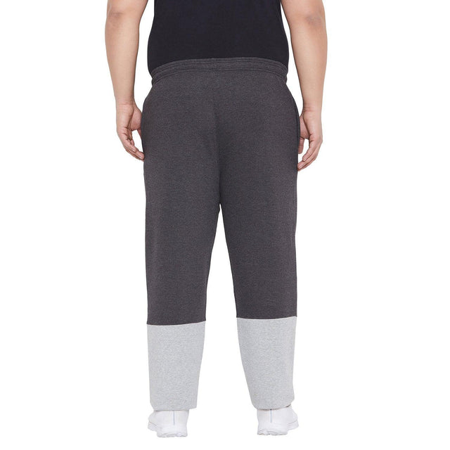 Men's plus size dark grey joggers with light grey color block cuffs, back view