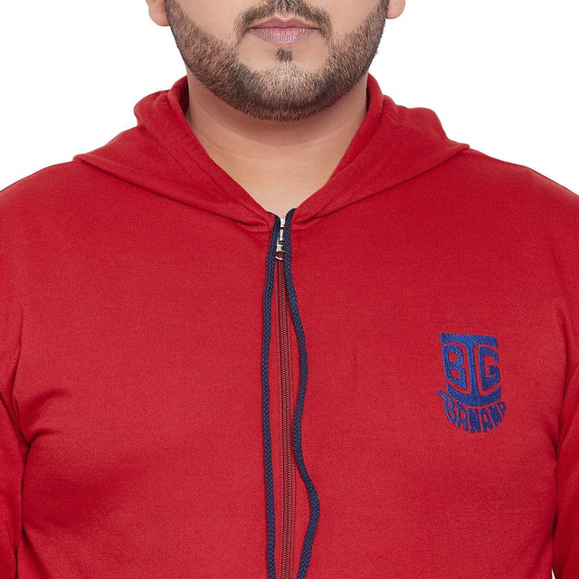Close-up of a man wearing a red plus size zip-up hoodie with blue logo and drawstrings
