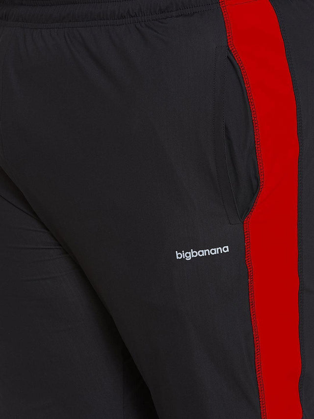 Black plus size men's joggers with red side stripe and elastic waistband