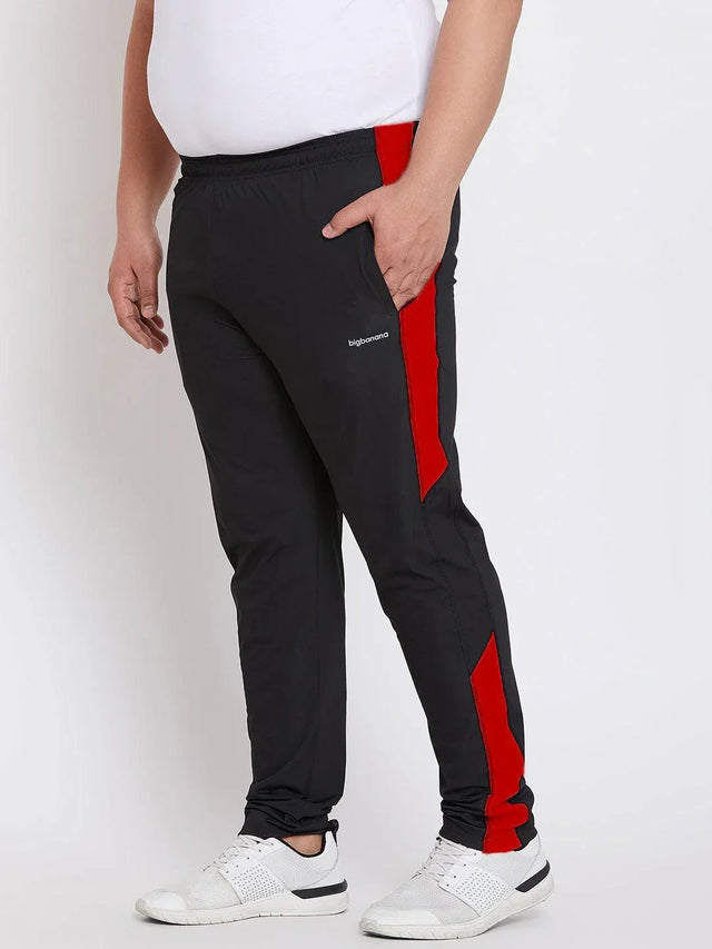 Men's plus size black joggers with red side stripes and elastic waist, sporty fit