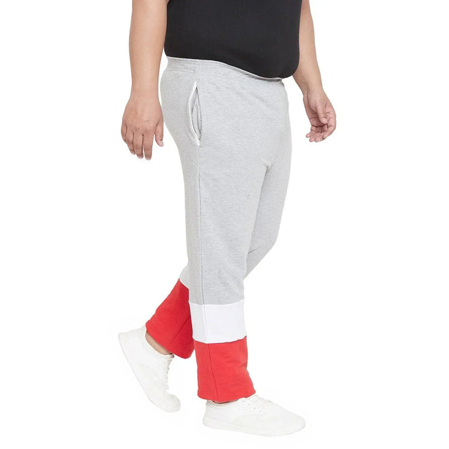 Men's plus size joggers in grey with red and white color block design, side pocket, white sneakers