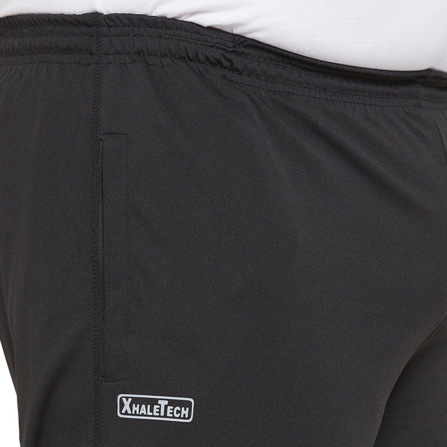 Black plus size men's joggers with elastic waistband and side pocket, XhaleTech label visible